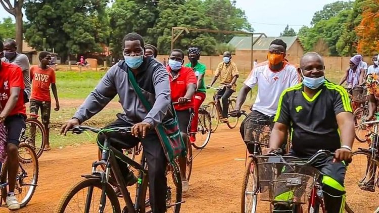 Catholic Bishop and Youth Ride Bicycles to Raise Awareness on Covid-19