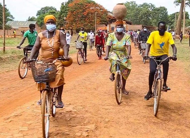 Catholic Bishop and Youth Ride Bicycles to Raise Awareness on Covid-19